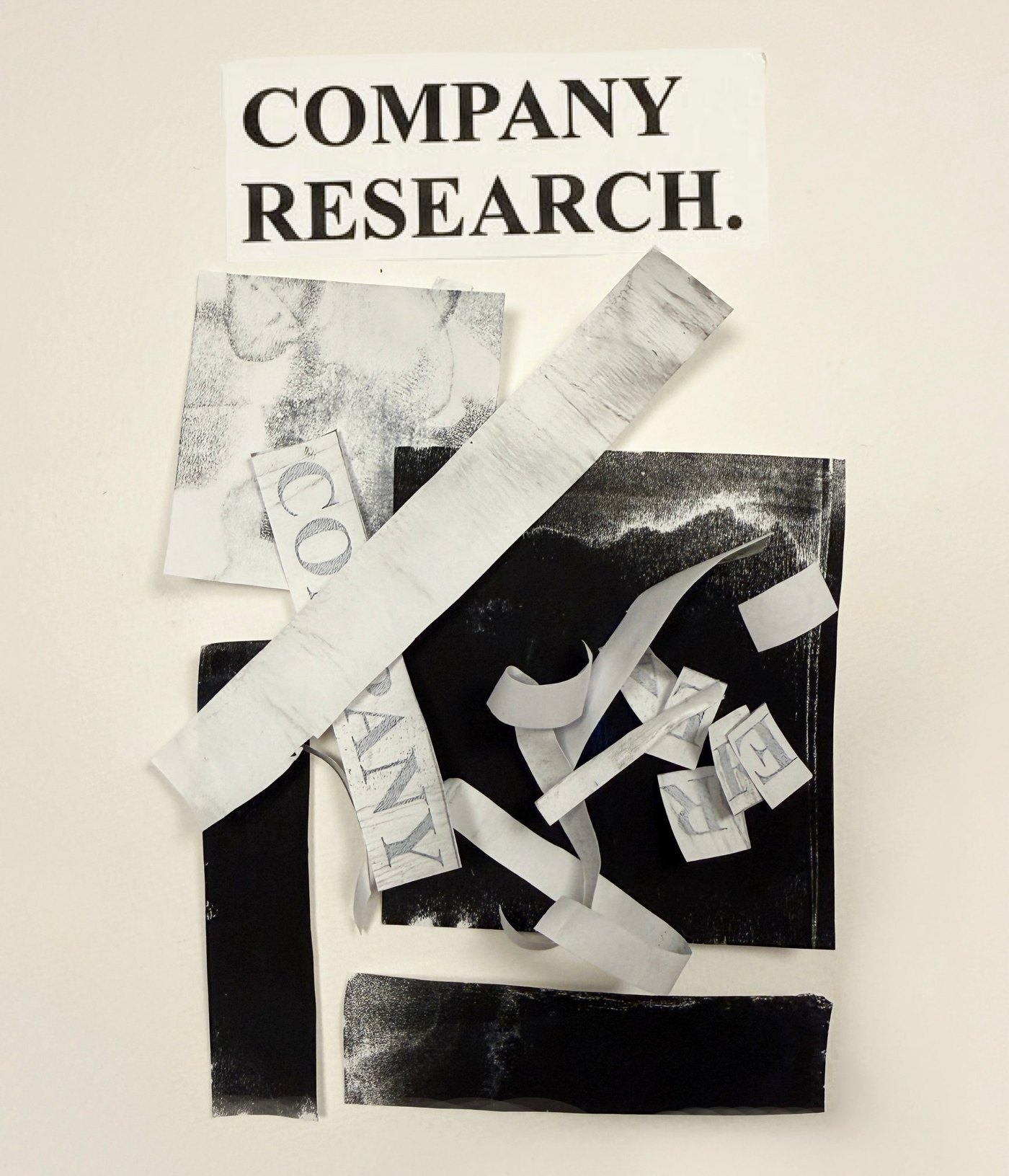 Company Research. A collage of cut and torn paper in black, white and grey, with fragments of the letters of the word company.